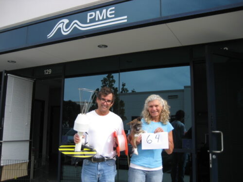 pme founders holding product and dog