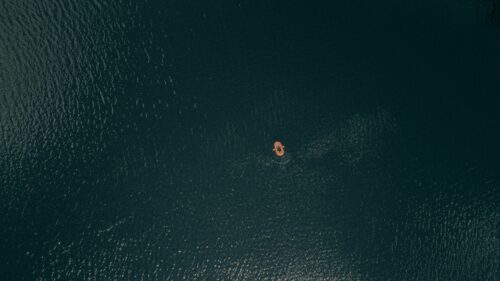 Graphic of Crystal Lake with lone kayak